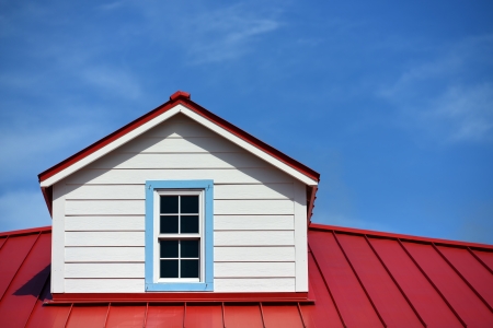 red roof and blue trim window 